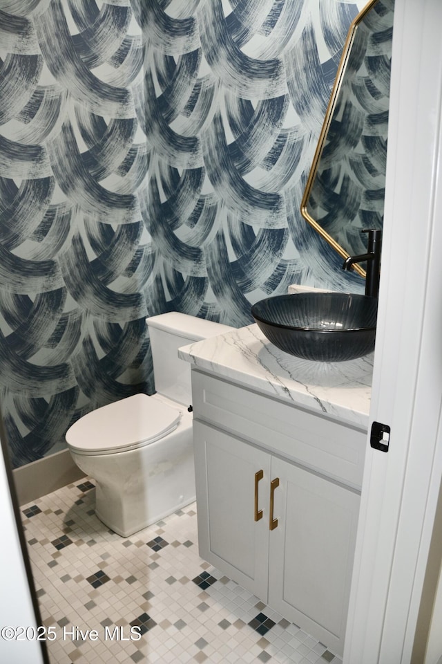 120 Fairview Rd, Leland, NC 28451 - bathroom featuring vanity, toilet, and tile patterned floors