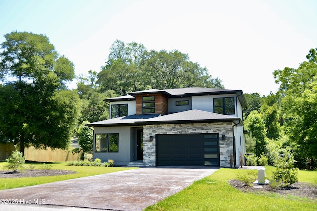 120 Fairview Rd, Leland, NC 28451 - view of front of property with concrete driveway, stone siding, a garage, stucco siding, and a front lawn