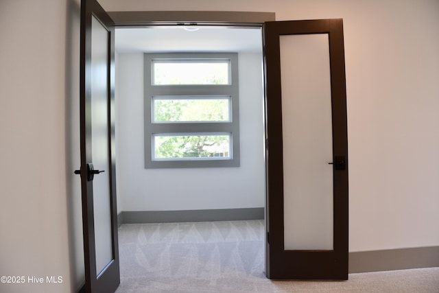 120 Fairview Rd, Leland, NC 28451 - corridor with carpet, plenty of natural light, and baseboards