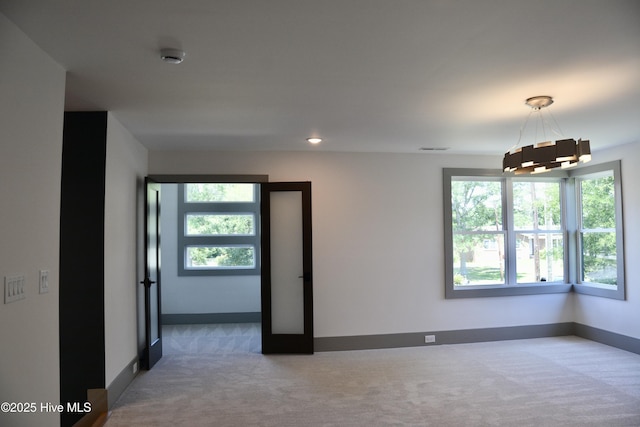 120 Fairview Rd, Leland, NC 28451 - spare room with light carpet, baseboards, and a smoke detector