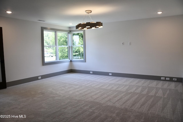 120 Fairview Rd, Leland, NC 28451 - empty room featuring carpet floors, baseboards, recessed lighting, and a chandelier