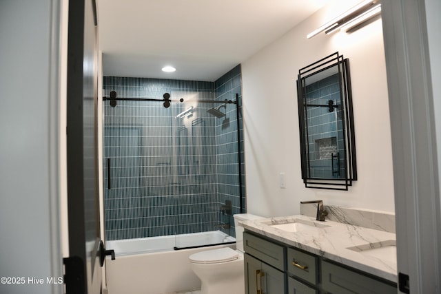 120 Fairview Rd, Leland, NC 28451 - bathroom with double vanity, toilet, combined bath / shower with glass door, and recessed lighting