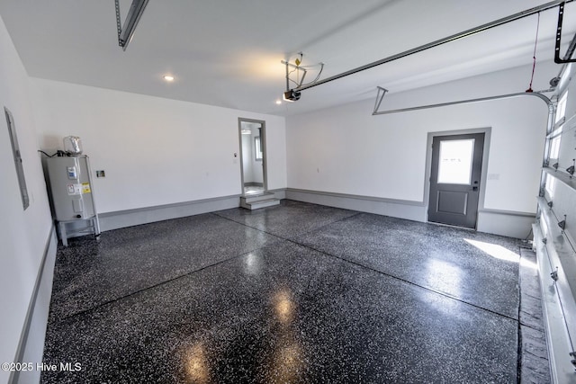 120 Fairview Rd, Leland, NC 28451 - garage featuring electric water heater, a garage door opener, and recessed lighting