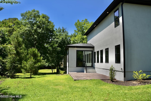 120 Fairview Rd, Leland, NC 28451 - view of grassy yard with a patio and entry steps