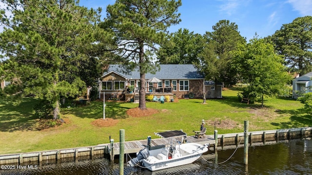 6008 Cassowary Ln, New Bern, NC 28560 - dock area with a water view and a lawn