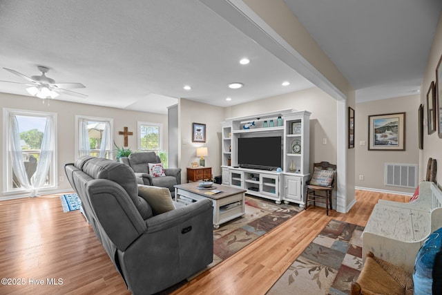 6008 Cassowary Ln, New Bern, NC 28560 - living room featuring light wood-style floors, a ceiling fan, recessed lighting, and baseboards