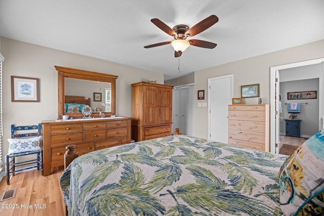 6008 Cassowary Ln, New Bern, NC 28560 - bedroom with light wood-type flooring, ceiling fan, and connected bathroom
