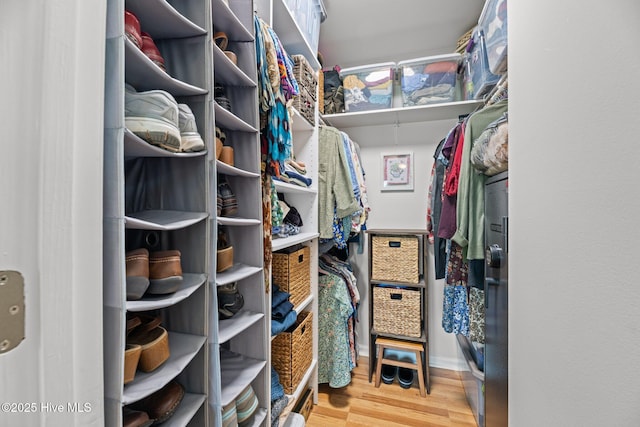 6008 Cassowary Ln, New Bern, NC 28560 - walk in closet featuring wood finished floors