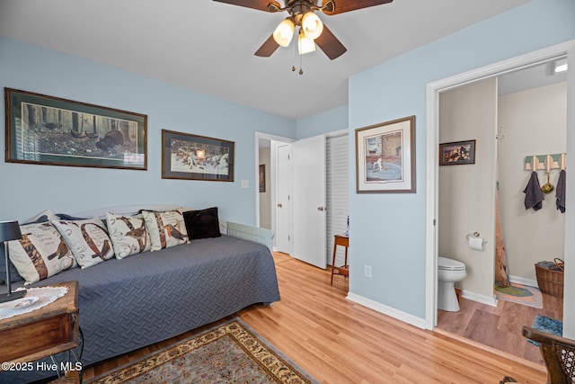 6008 Cassowary Ln, New Bern, NC 28560 - living area with wood finished floors, a ceiling fan, and baseboards