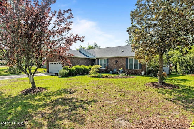 6008 Cassowary Ln, New Bern, NC 28560 - single story home featuring driveway, a garage, a front yard, and brick siding