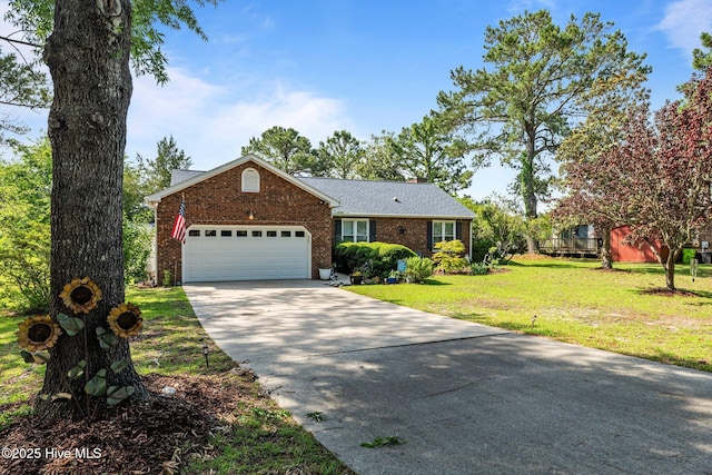 6008 Cassowary Ln, New Bern, NC 28560 - view of front of house featuring an attached garage, brick siding, driveway, and a front lawn