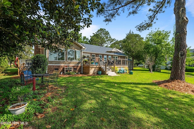 6008 Cassowary Ln, New Bern, NC 28560 - view of grassy yard featuring a wooden deck and stairs