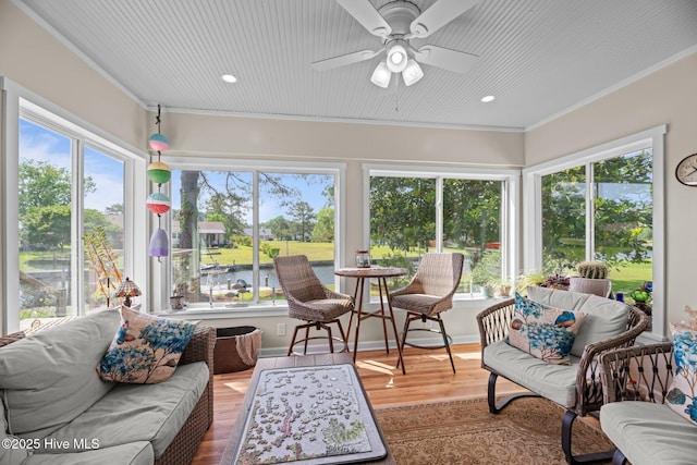 6008 Cassowary Ln, New Bern, NC 28560 - sunroom / solarium featuring ornamental molding, wood finished floors, and recessed lighting