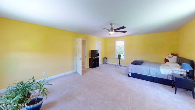 44 Nassau Ct, Clayton, NC 27520 - bedroom with baseboards, light colored carpet, and a ceiling fan