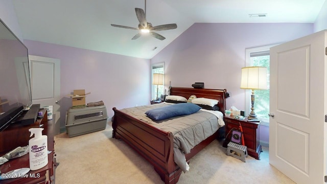 44 Nassau Ct, Clayton, NC 27520 - bedroom with lofted ceiling, light carpet, multiple windows, and a ceiling fan
