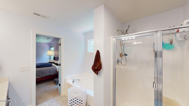 44 Nassau Ct, Clayton, NC 27520 - ensuite bathroom with a garden tub, a shower stall, and vanity