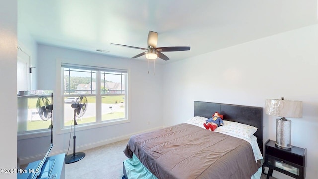 44 Nassau Ct, Clayton, NC 27520 - carpeted bedroom with baseboards and ceiling fan