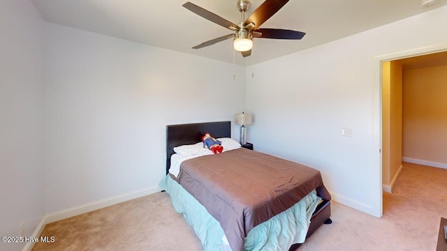 44 Nassau Ct, Clayton, NC 27520 - bedroom with light colored carpet, baseboards, and ceiling fan