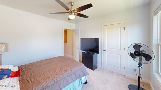 44 Nassau Ct, Clayton, NC 27520 - bedroom featuring light colored carpet, ceiling fan, and baseboards
