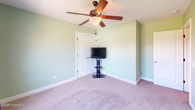 44 Nassau Ct, Clayton, NC 27520 - unfurnished bedroom featuring carpet floors, baseboards, and a ceiling fan