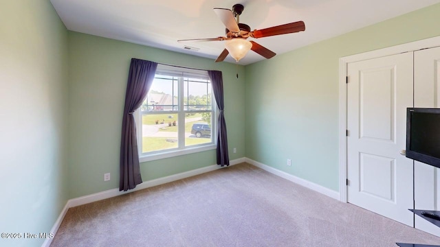 44 Nassau Ct, Clayton, NC 27520 - empty room featuring carpet floors, a ceiling fan, and baseboards