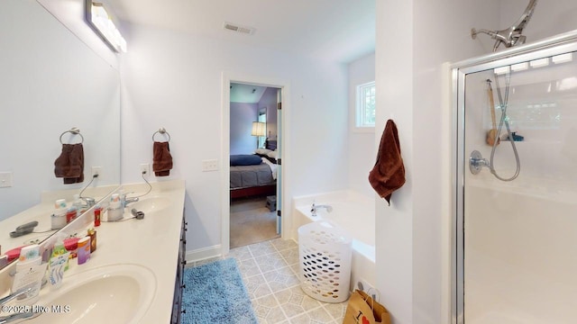 44 Nassau Ct, Clayton, NC 27520 - bathroom with a shower stall, a bath, double vanity, and ensuite bath