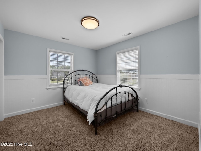 120 Buds Ln, Cedar Point, NC 28584 - carpeted bedroom featuring a wainscoted wall