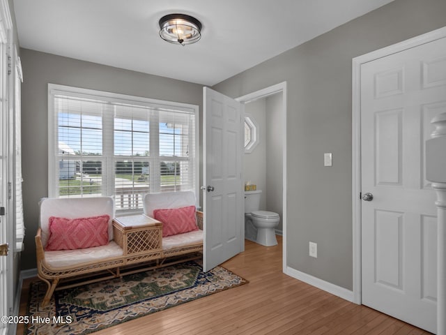 120 Buds Ln, Cedar Point, NC 28584 - sitting room with light wood finished floors and baseboards