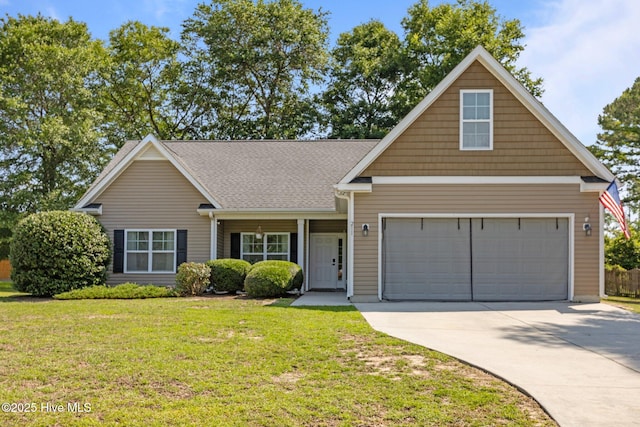 211 Bill Canady Rd, Sneads Ferry, NC 28460 - traditional-style home with concrete driveway, a front lawn, and a shingled roof