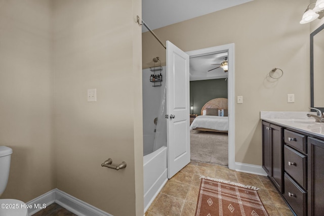 211 Bill Canady Rd, Sneads Ferry, NC 28460 - ensuite bathroom with vanity, a ceiling fan, washtub / shower combination, toilet, and baseboards