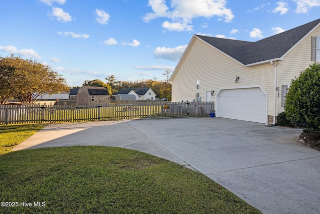531 S NC Highway 343, Camden, NC 27921 - view of property exterior featuring driveway, a garage, and roof with shingles