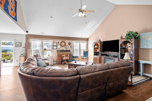 531 S NC Highway 343, Camden, NC 27921 - living room featuring wood finished floors, ceiling fan, plenty of natural light, high vaulted ceiling, and baseboards