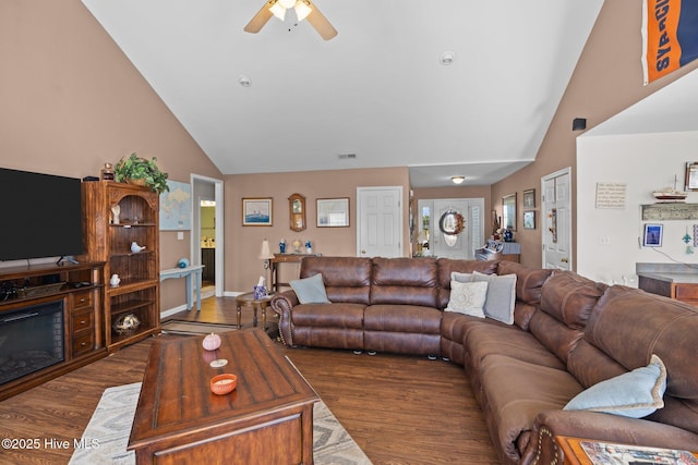 531 S NC Highway 343, Camden, NC 27921 - living room featuring dark wood-style floors, a ceiling fan, and high vaulted ceiling