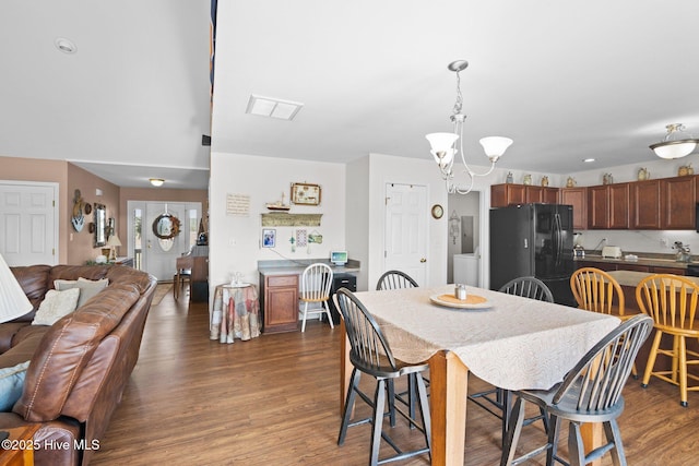 531 S NC Highway 343, Camden, NC 27921 - dining room featuring dark wood-style floors and a chandelier