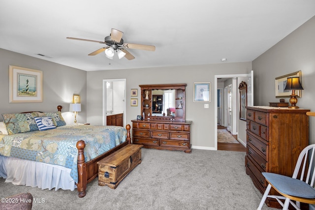 531 S NC Highway 343, Camden, NC 27921 - bedroom featuring carpet floors, a ceiling fan, ensuite bathroom, and baseboards