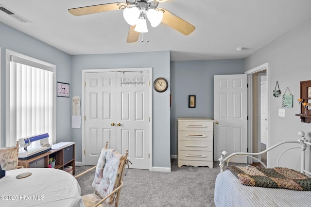 531 S NC Highway 343, Camden, NC 27921 - carpeted bedroom featuring a closet, ceiling fan, and baseboards