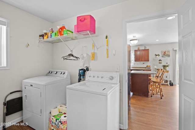 531 S NC Highway 343, Camden, NC 27921 - laundry room featuring washer and clothes dryer, light wood-type flooring, recessed lighting, and healthy amount of natural light