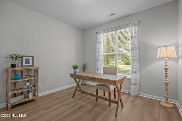1424 Elgin St, Wilmington, NC 28409 - office area with light wood-style floors and baseboards