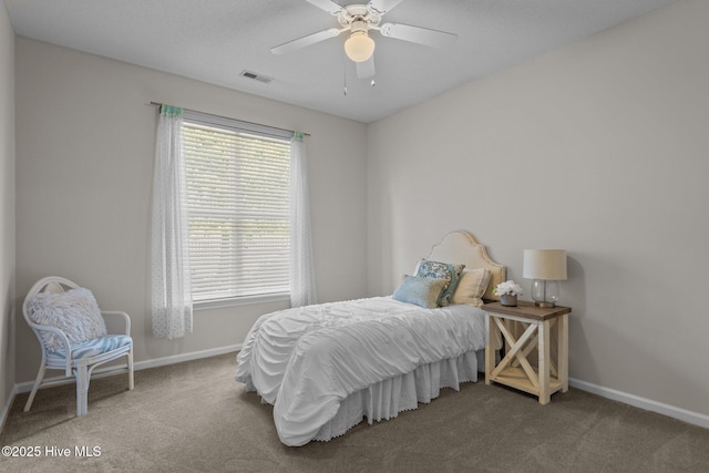 1424 Elgin St, Wilmington, NC 28409 - carpeted bedroom with baseboards and ceiling fan