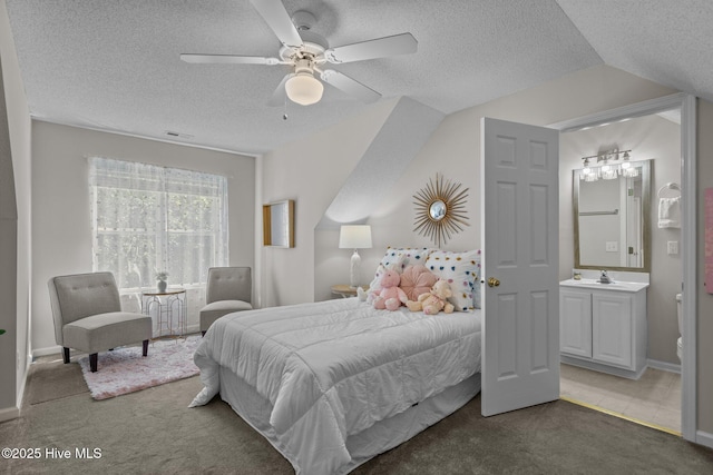 1424 Elgin St, Wilmington, NC 28409 - carpeted bedroom featuring a textured ceiling, ceiling fan, and lofted ceiling