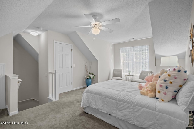 1424 Elgin St, Wilmington, NC 28409 - bedroom featuring carpet flooring, a textured ceiling, vaulted ceiling, and ceiling fan