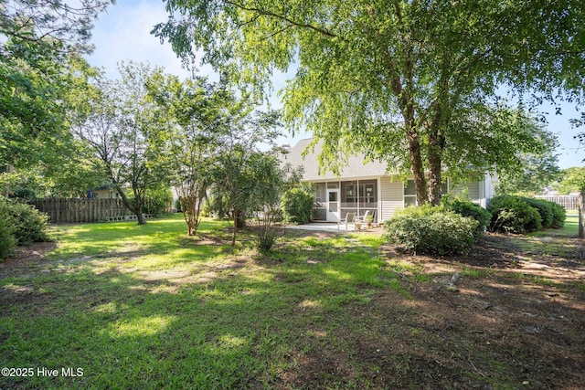 1424 Elgin St, Wilmington, NC 28409 - view of yard with a patio and a sunroom