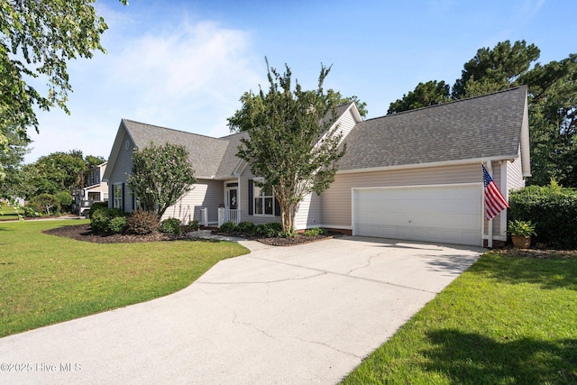 1424 Elgin St, Wilmington, NC 28409 - view of front facade featuring a garage, driveway, roof with shingles, and a front yard