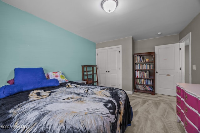 285 Mimosa Dr, Sneads Ferry, NC 28460 - bedroom featuring light carpet, a closet, and baseboards