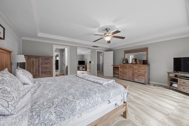 285 Mimosa Dr, Sneads Ferry, NC 28460 - bedroom with crown molding, a tray ceiling, carpet flooring, ceiling fan, and baseboards