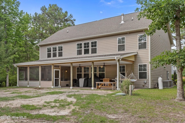 285 Mimosa Dr, Sneads Ferry, NC 28460 - back of property featuring a sunroom, ceiling fan, central AC, a patio, and a yard