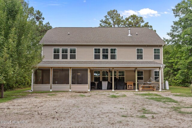285 Mimosa Dr, Sneads Ferry, NC 28460 - back of house with a sunroom and a shingled roof