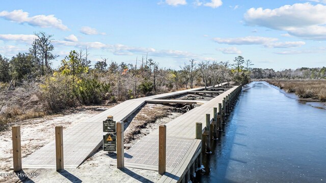 285 Mimosa Dr, Sneads Ferry, NC 28460 - dock area with view of scattered trees