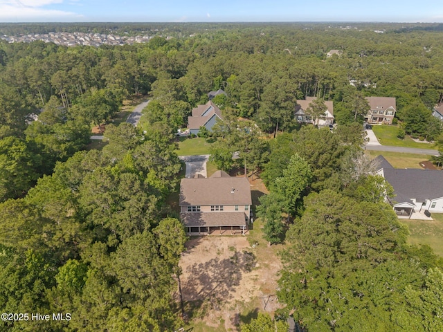 285 Mimosa Dr, Sneads Ferry, NC 28460 - aerial view of property and surrounding area featuring a forest and nearby suburban area