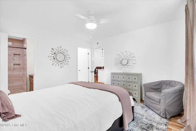 522 S Kerr Ave Unit 66, Wilmington, NC 28403 - bedroom featuring ensuite bathroom, ceiling fan, and wood finished floors